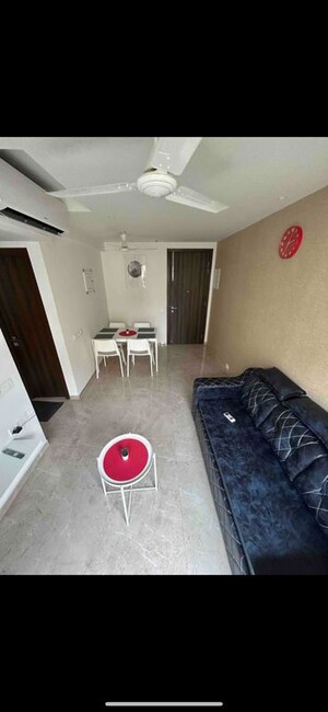 Living Room in 1 BHK Apartment at Hiranandani Regent Hill, Powai – for Rent