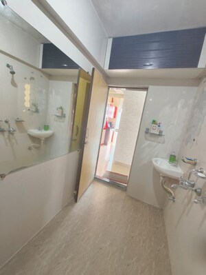 Washroom in 1 BHK Apartment at Raunak 108, Kasarvadavali – for Rent