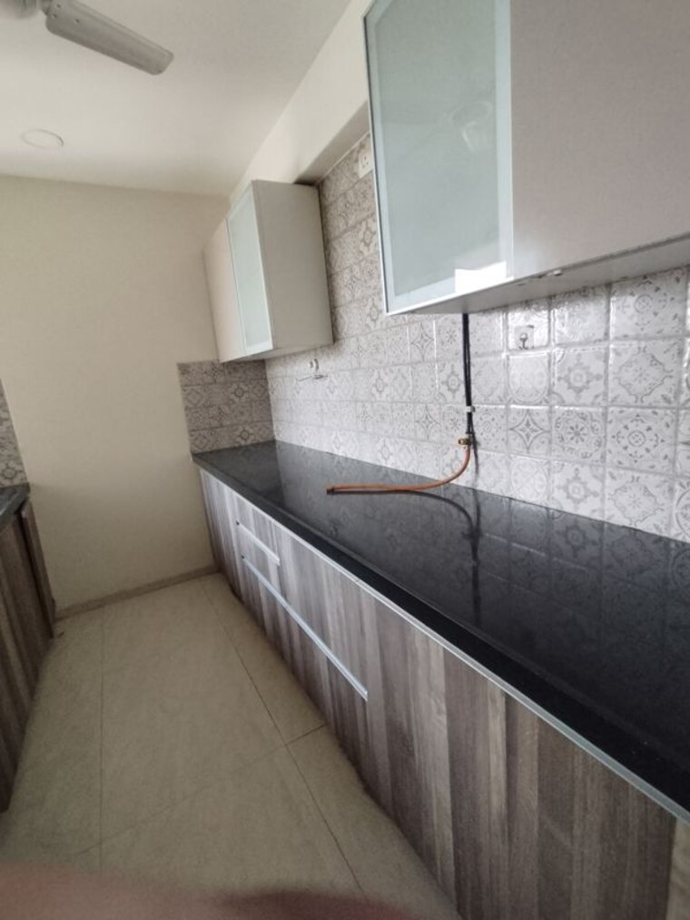 Kitchen, supreme-19 2 Bedroom 695 Sq.Ft. Apartment In Lokhandwala Mumbai 10374644