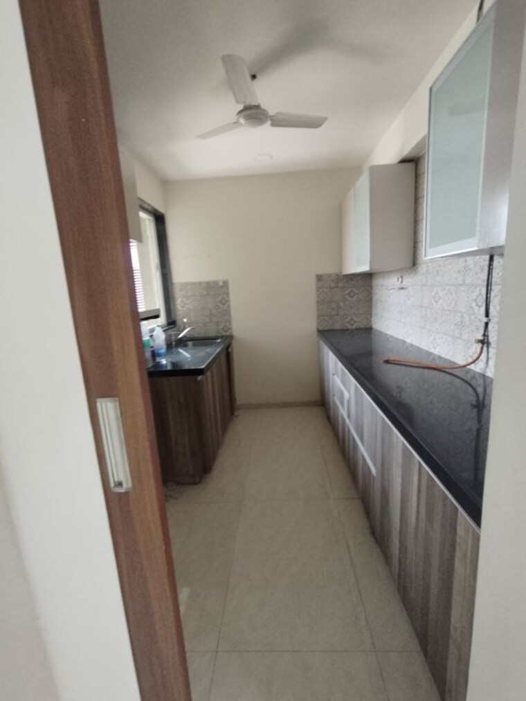 Kitchen, supreme-19 2 Bedroom 695 Sq.Ft. Apartment In Lokhandwala Mumbai 10374644