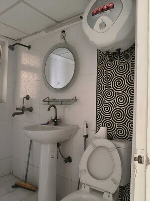 Bathroom in 3 BHK Apartment at Paramount Floraville, Sector 137 – for Sale