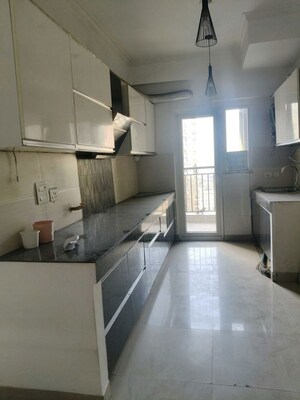 Kitchen in 3 BHK Apartment at Paramount Floraville, Sector 137 – for Sale