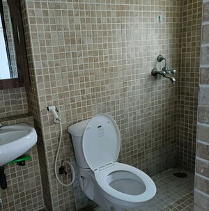Bathroom in 3 BHK Apartment at Paras Tierea Studio Apartments, Sector 137 – for Sale