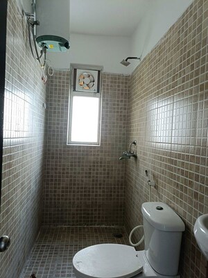 Bathroom in 3 BHK Apartment at Paras Tierea Studio Apartments, Sector 137 – for Sale