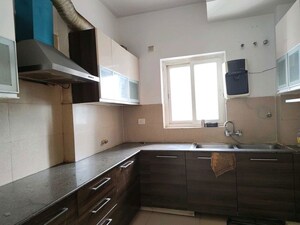 Kitchen in 3 BHK Apartment at Purvanchal Royal Park, Sector 137 – for Sale