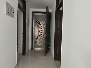 Building Lobby in 3 BHK Apartment at Purvanchal Royal Park, Sector 137 – for Sale