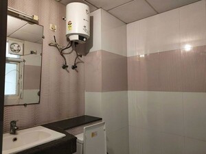 Bathroom in 3 BHK Apartment at Purvanchal Royal Park, Sector 137 – for Sale