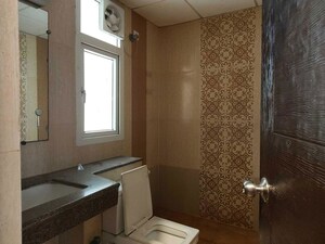 Bathroom in 3 BHK Apartment at Purvanchal Royal Park, Sector 137 – for Sale
