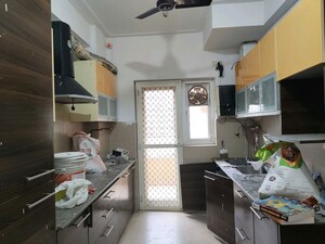 Kitchen in 3 BHK Apartment at Purvanchal Royal Park, Sector 137 – for Sale