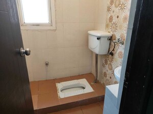 Bathroom in 3 BHK Apartment at Purvanchal Royal Park, Sector 137 – for Sale
