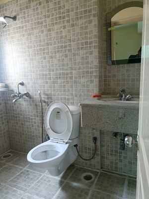 Bathroom in 2 BHK Apartment at Paras Tierea Studio Apartments, Sector 137 – for Sale