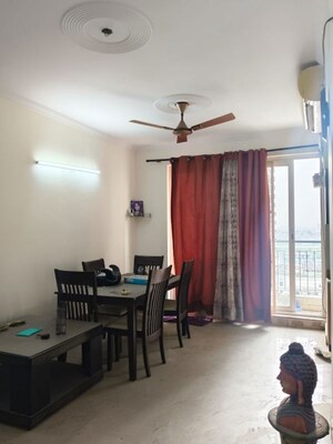 Living Room in 2.5 BHK Apartment at Mahagun Moderne, Sector 78 – for Rent