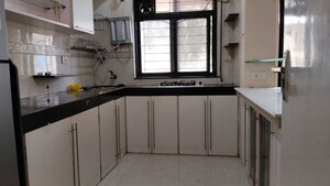 Kitchen in 2 BHK Apartment at Solitaire Heights, Malad West – for Rent
