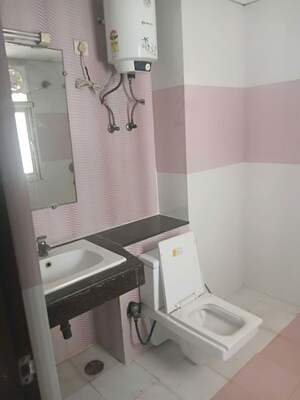 Bathroom in 3 BHK Apartment at Purvanchal Royal Park, Sector 137 – for Sale