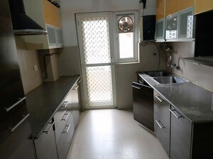 Kitchen in 3 BHK Apartment at Purvanchal Royal Park, Sector 137 – for Sale