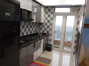 Kitchen in 2 BHK Apartment at Omkar Alta Monte, Malad East – for Rent