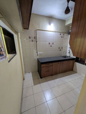 Kitchen in 1 BHK Apartment at Raunak Residency Thane, Pokhran Road No One – for Rent
