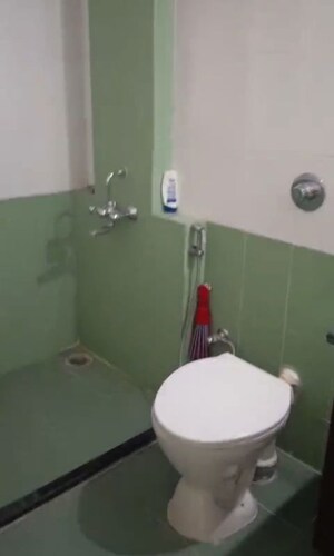 Bathroom in 2 BHK Apartment at Kanakia Spaces Niharika, Manpada – for Rent