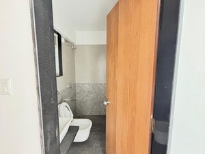 Bathroom in 4 BHK Apartment at Welworth Purnam, Hinjewadi – for Rent