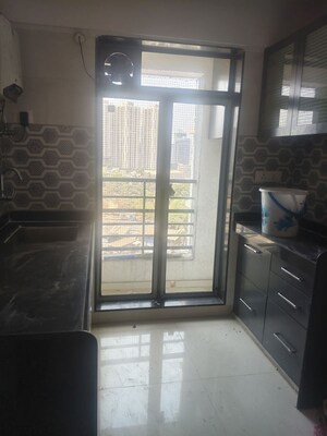 Kitchen in 1 BHK Apartment at Sanghavi Orchid, Mira Road – for Sale