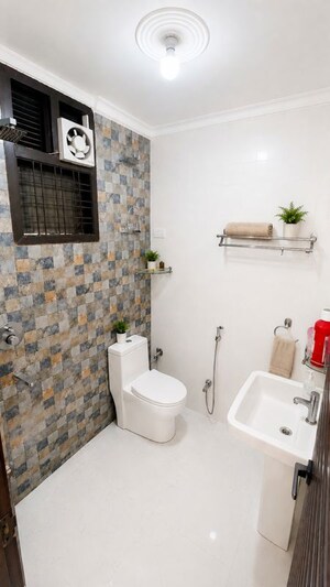 Bathroom in 2 BHK Builder Floor at Chattarpur – for Rent