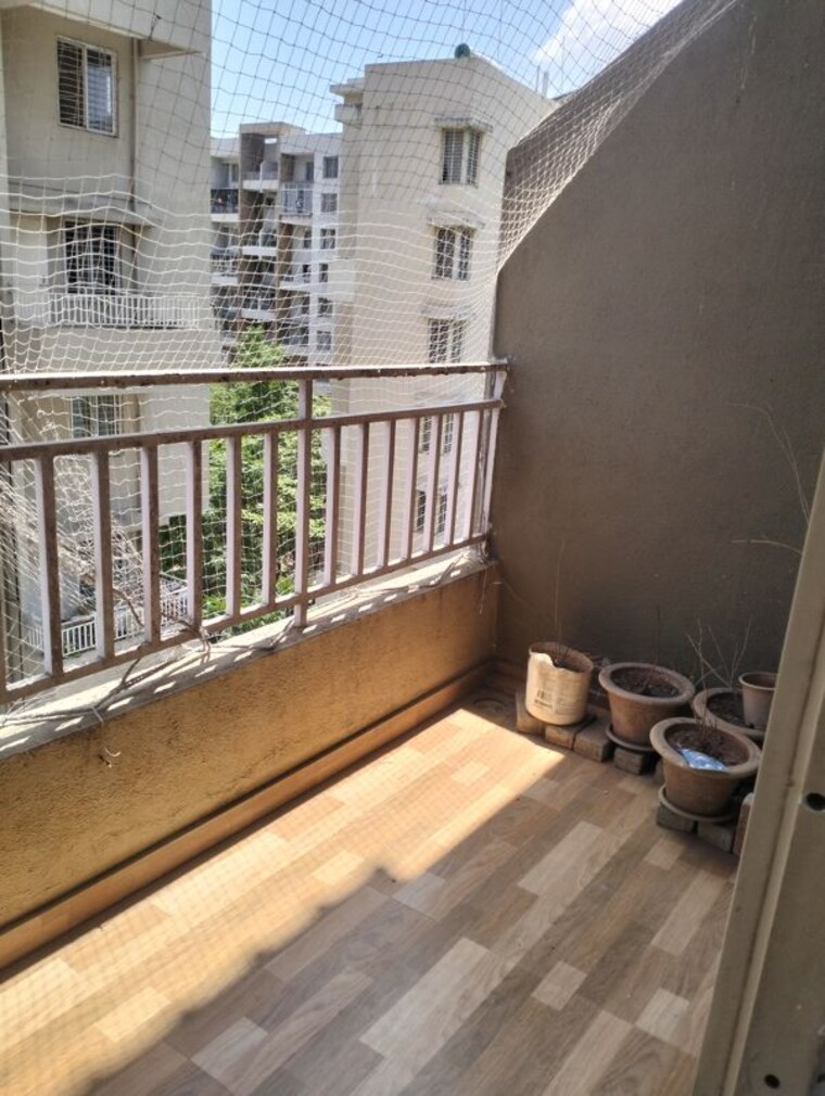 Balcony, bhondve-empire 2 Bedroom 950 Sq.Ft. Apartment In Ravet Pune 10374963