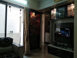 Living Room in 2 BHK Apartment at Sudhir Krishnakala CHS, Dahanukar Colony – for Rent