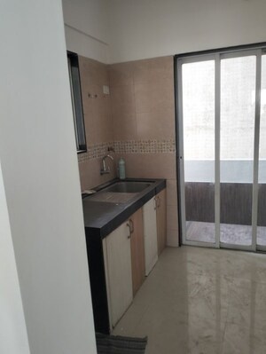 Kitchen in 2 BHK Apartment at Rama Celestial City Phase II, Ravet – for Rent