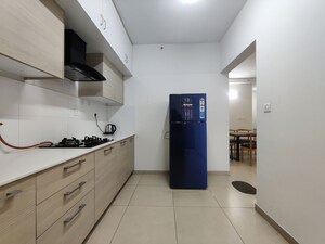 Kitchen in 3.5 BHK Apartment at Bhartiya Nikoo Homes Phase 2, Thanisandra Main Road – for Rent