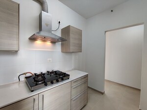 Kitchen in 3.5 BHK Apartment at Bhartiya Nikoo Homes Phase 2, Thanisandra Main Road – for Rent