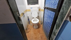 Bathroom in 1 BHK Apartment at Fam CHS, Kopar Khairane – for Rent