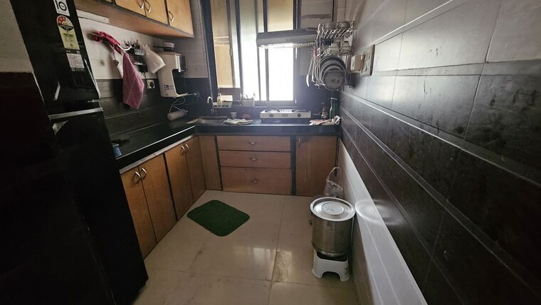 Kitchen, fam-chs 1 Bedroom 548 Sq.Ft. Apartment In Kopar Khairane Navi Mumbai 10375082
