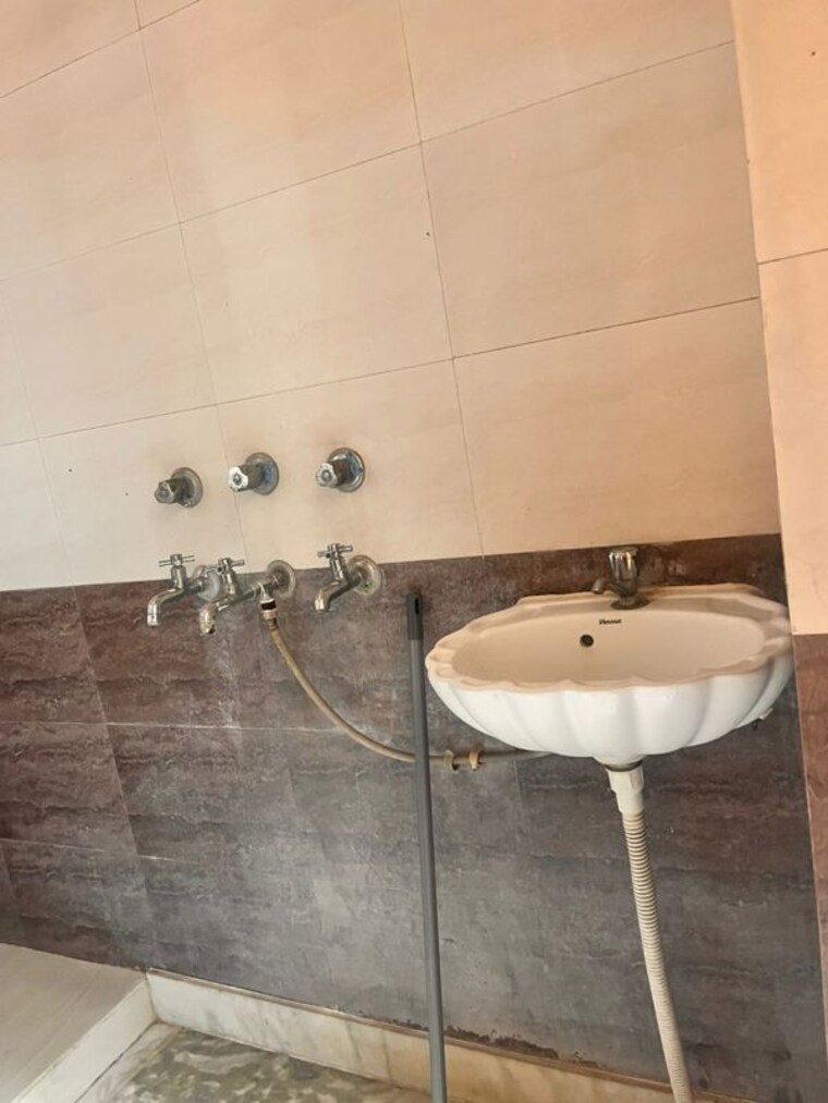 Washroom, migsun-alpha-central 2 Bedroom 1200 Sq.Ft. Apartment In Alpha Ii Greater Noida Greater Noida 10375103