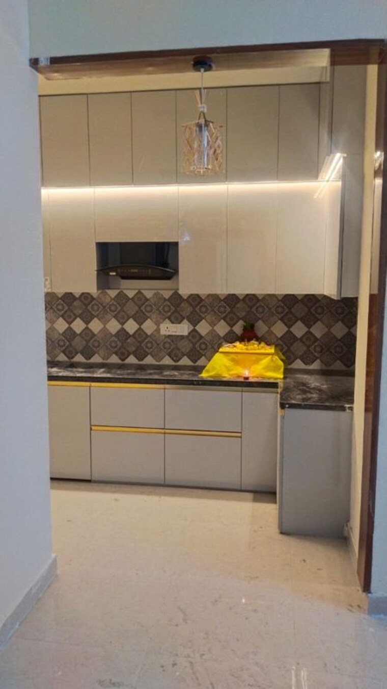 Kitchen, signature-the-millennia-3 2 Bedroom 680 Sq.Ft. Apartment In Sector 37d Gurgaon 10375106