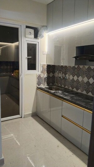 Kitchen in 2 BHK Apartment at Signature The Millennia 3, Sector 37d – for Rent