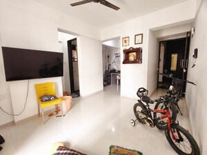 Living Room in 1 BHK Apartment at Ganraj Skydale, Mohammadwadi – for Rent