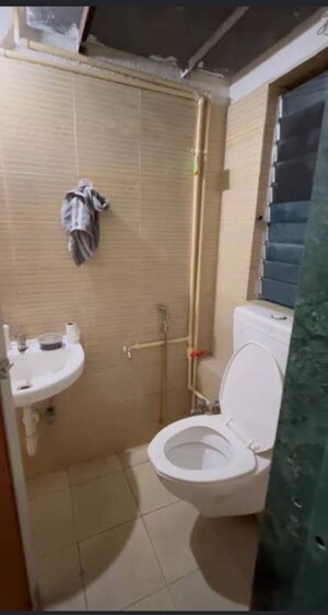 Bathroom in 2 BHK Apartment at Buddha Ozone 3, Mira Road – for Rent