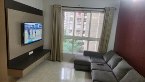 Living Room in 2 BHK Apartment at Lodha Amara, Kolshet Road – for Sale