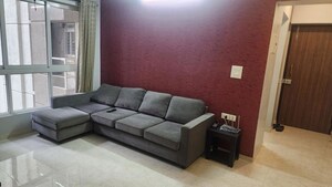 Living Room in 2 BHK Apartment at Lodha Amara, Kolshet Road – for Sale
