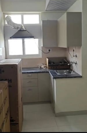 Kitchen in 1 BHK Apartment at Kingson ARV Arcade, Raj Nagar Extension – for Rent