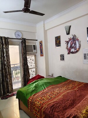 Bedroom in 2 BHK Apartment at Amrapali Royal, Vaibhav Khand – for Rent
