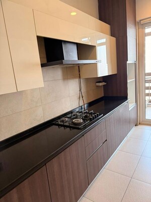 Kitchen in 4 BHK Apartment at Mahindra Luminare, Sector 59 – for Rent