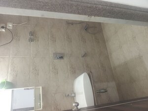 Bathroom in 3 BHK Apartment at Dimple Pinnacolo, Mira Road – for Rent