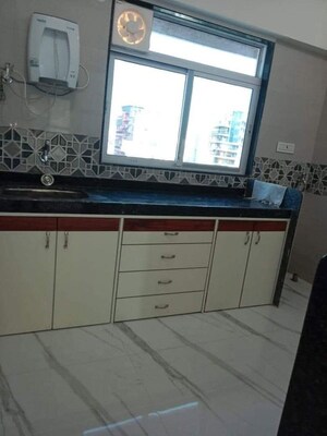 Kitchen in 2 BHK Apartment at DGS Sheetal Vaibhav, Khar West – for Sale