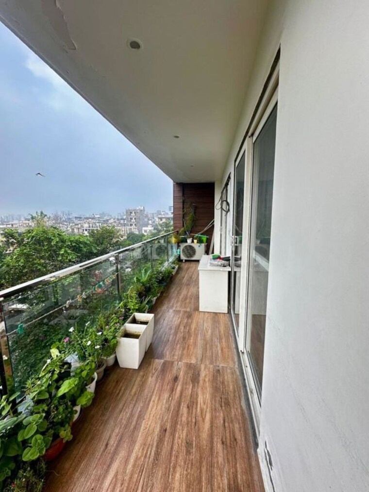 Balcony, ansal-executive-residency 4 Bedroom 300 Sq.Yd. Builder Floor In Sushant Lok ii Gurgaon 10375351