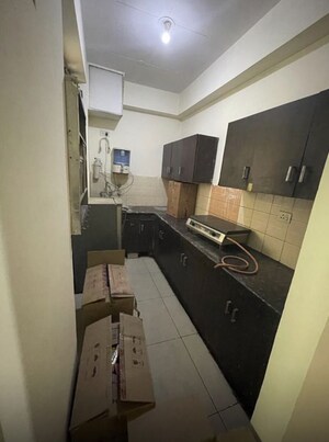 Kitchen in 2 BHK Apartment at Ajnara Grace, Raj Nagar Extension – for Rent