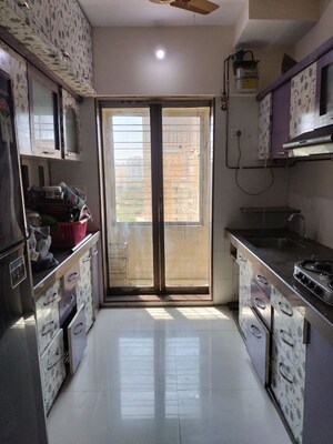 Kitchen in 2 BHK Apartment at Prakruti Pearl, Ghodbunder Road – for Sale