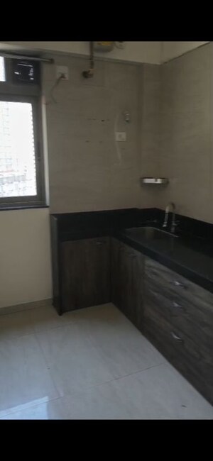 Kitchen in 2 BHK Apartment at Sheth Auris Serenity Tower 1, Malad West – for Rent