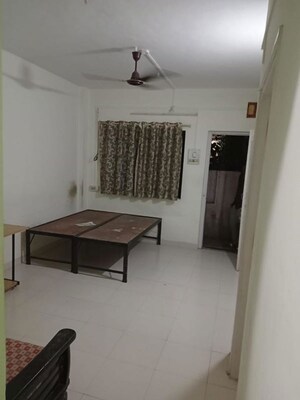 Team Area in 1 BHK Apartment at Jagrut CHS, Gokhalenagar – for Rent