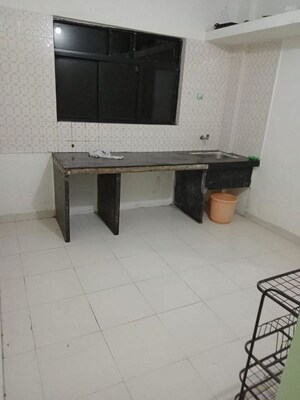 Kitchen in 1 BHK Apartment at Jagrut CHS, Gokhalenagar – for Rent